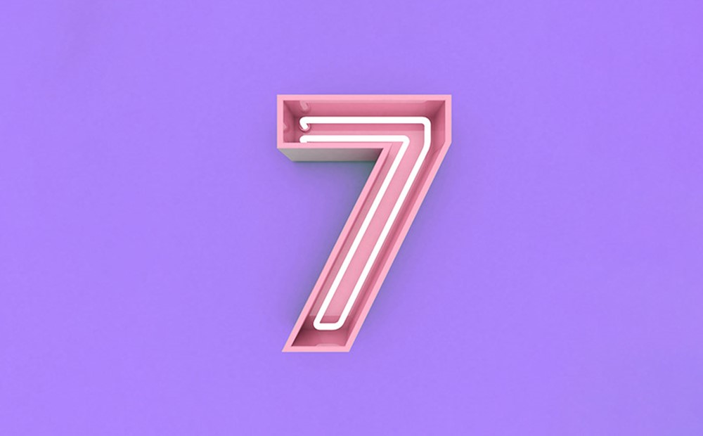 Hero image with a pink number 7 on a purple background