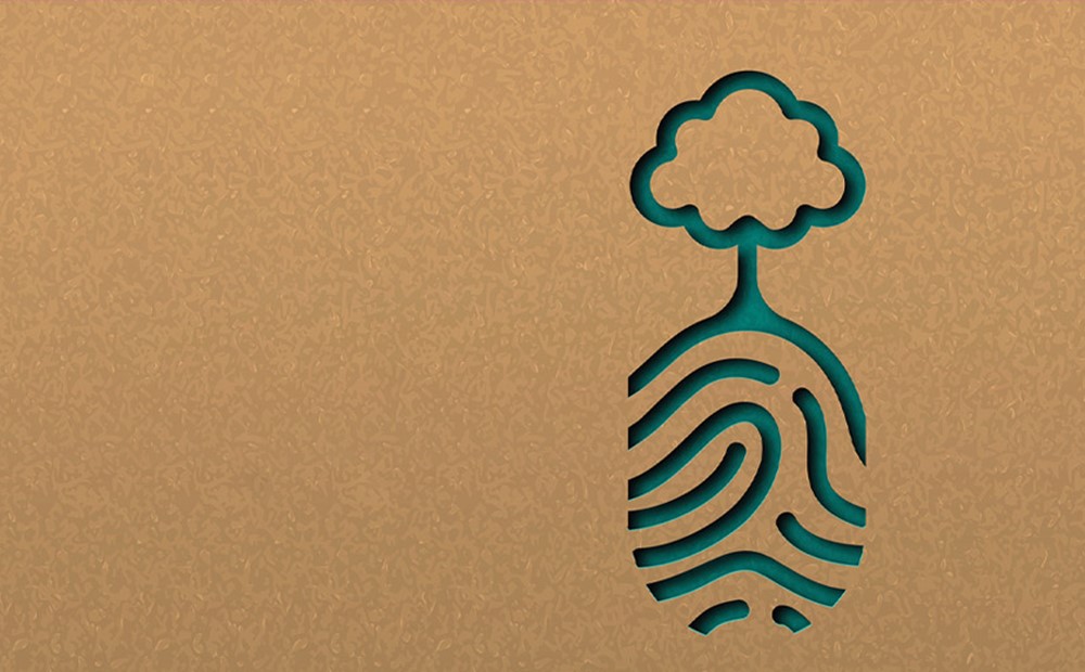 Image of a green fingerprint with a tree on top on a brown background