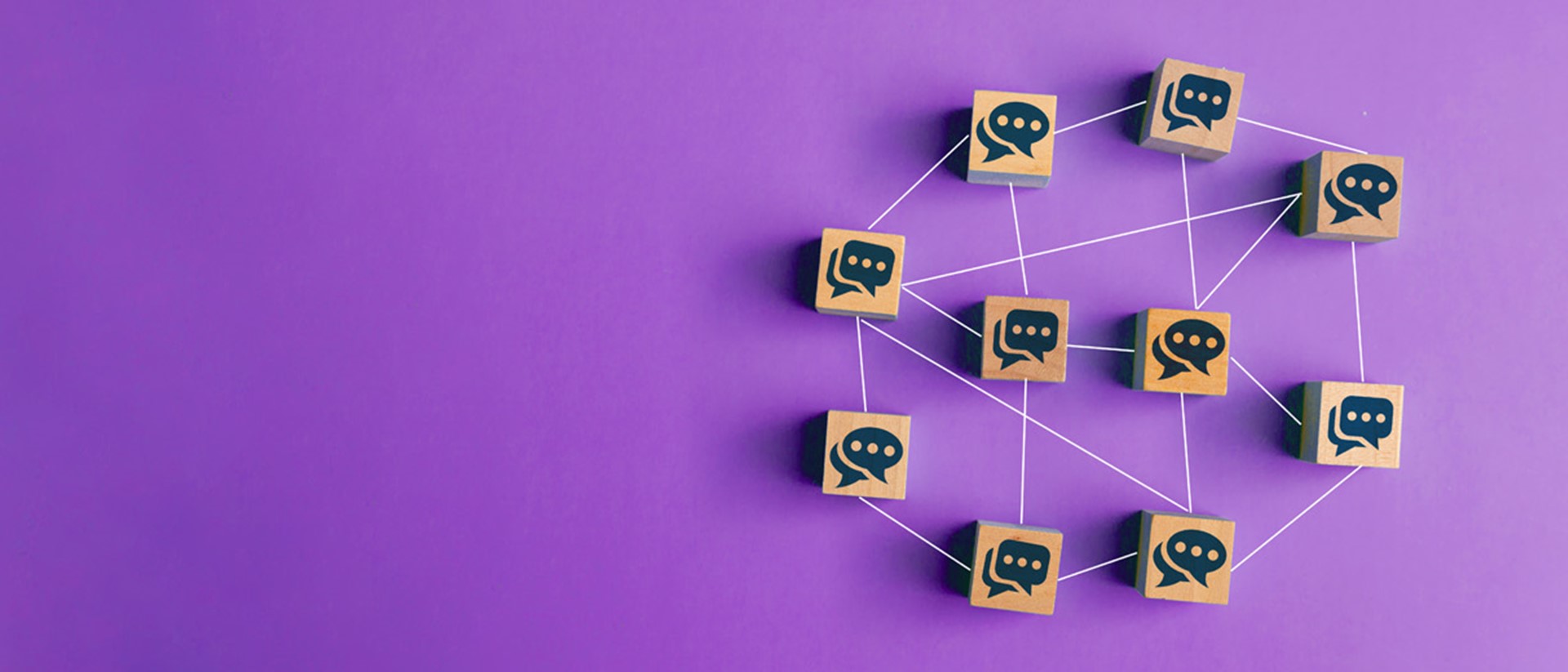 A web of multiple wooden blocks, each with a symbol of a brain against a purple background.
