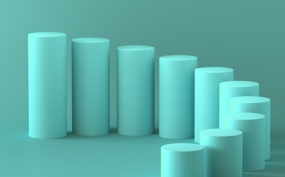 A group of teal cylinders resembling cups and candles in various shapes and sizes are arranged in a row on a teal background.