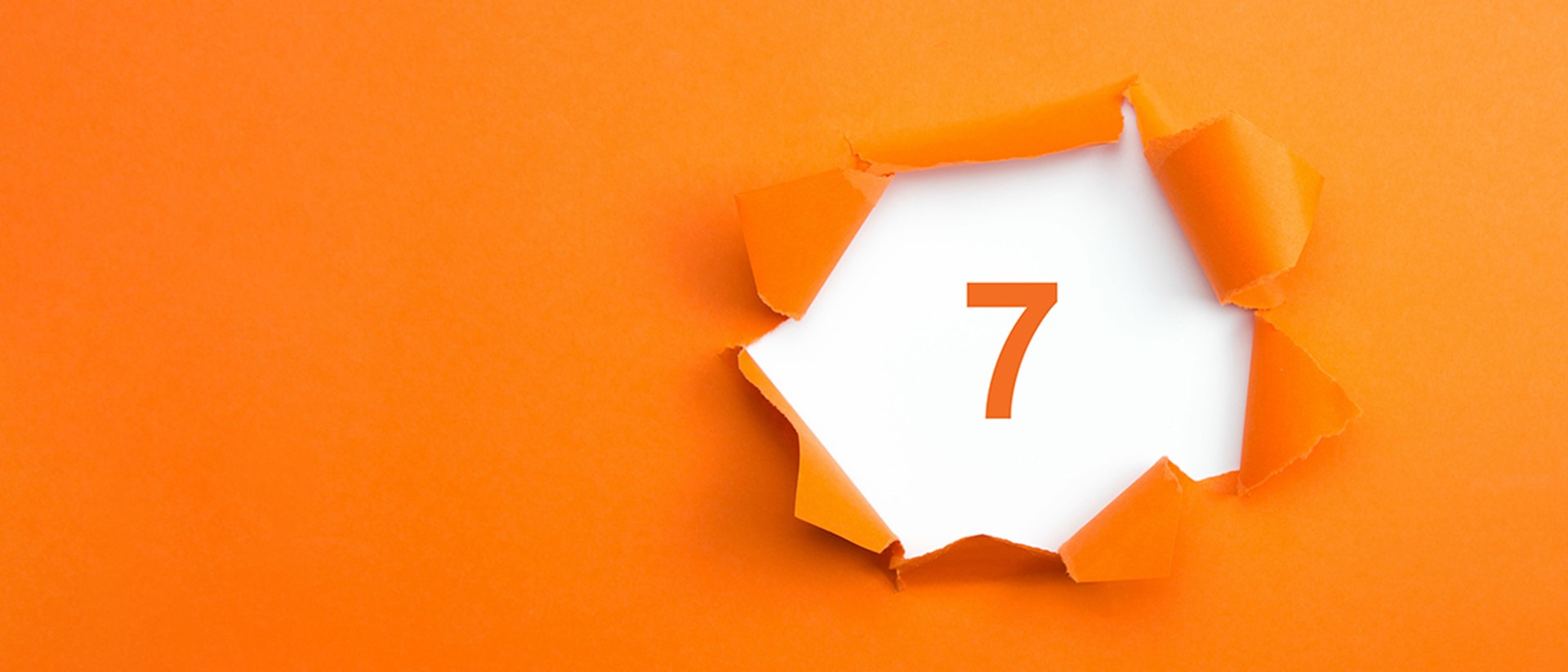 Image of the number 7 on an orange background