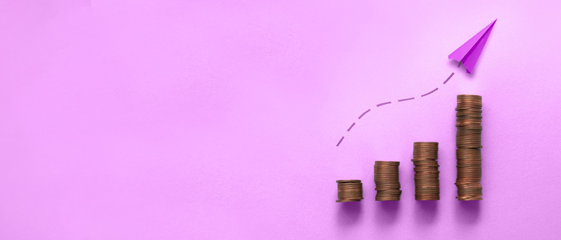 Image of a purple paper airplane flying above a stack of coins against a purple background