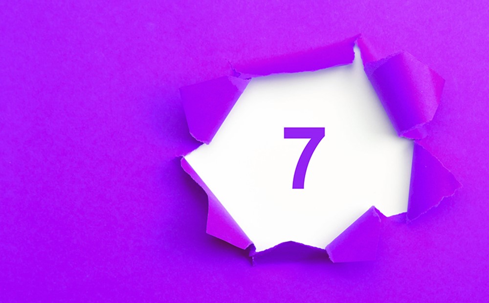 Image of the number 7 on a purple background