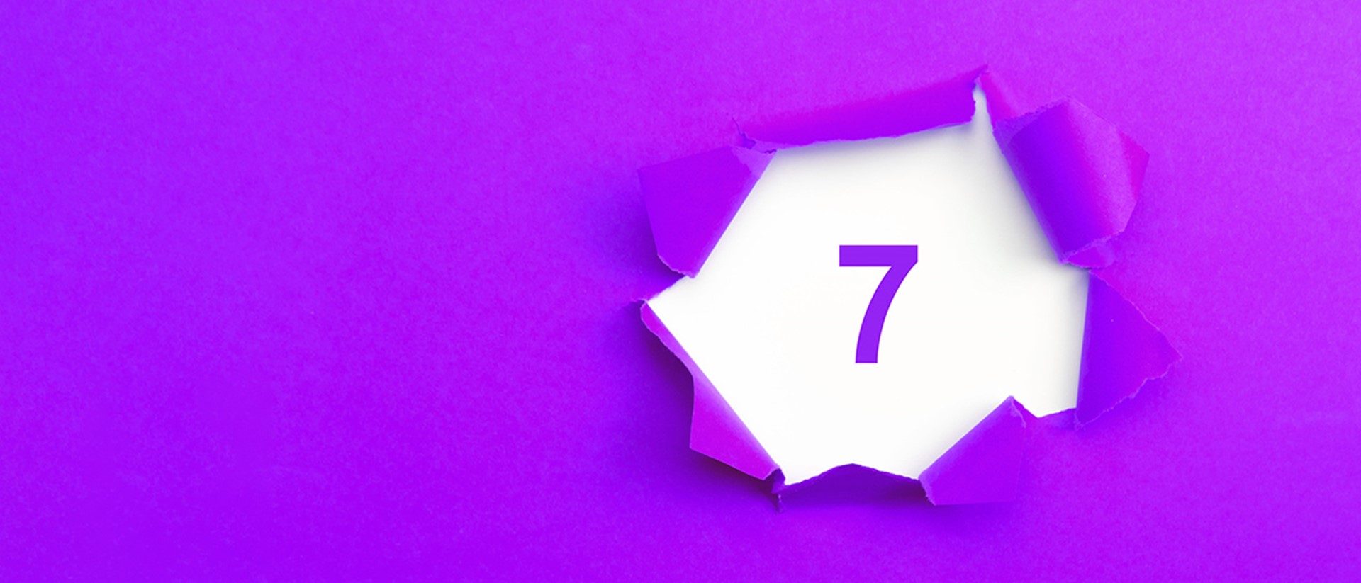 Image of the number 7 on a purple background