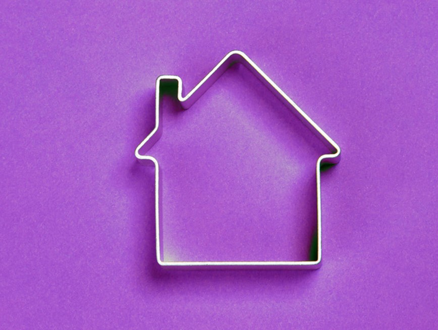 Outline of a house against a purple background