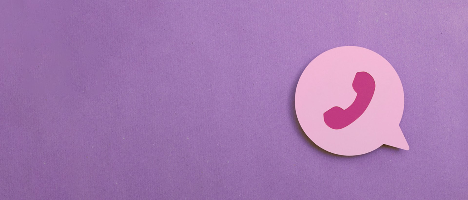 Image of a pink phone icon against a purple background