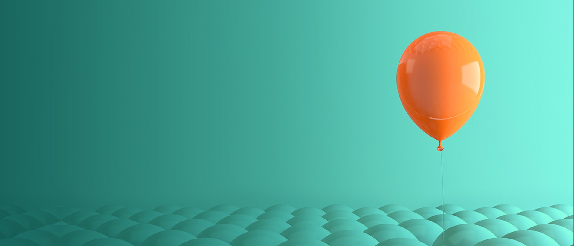 Image of an orange balloon on a teal background