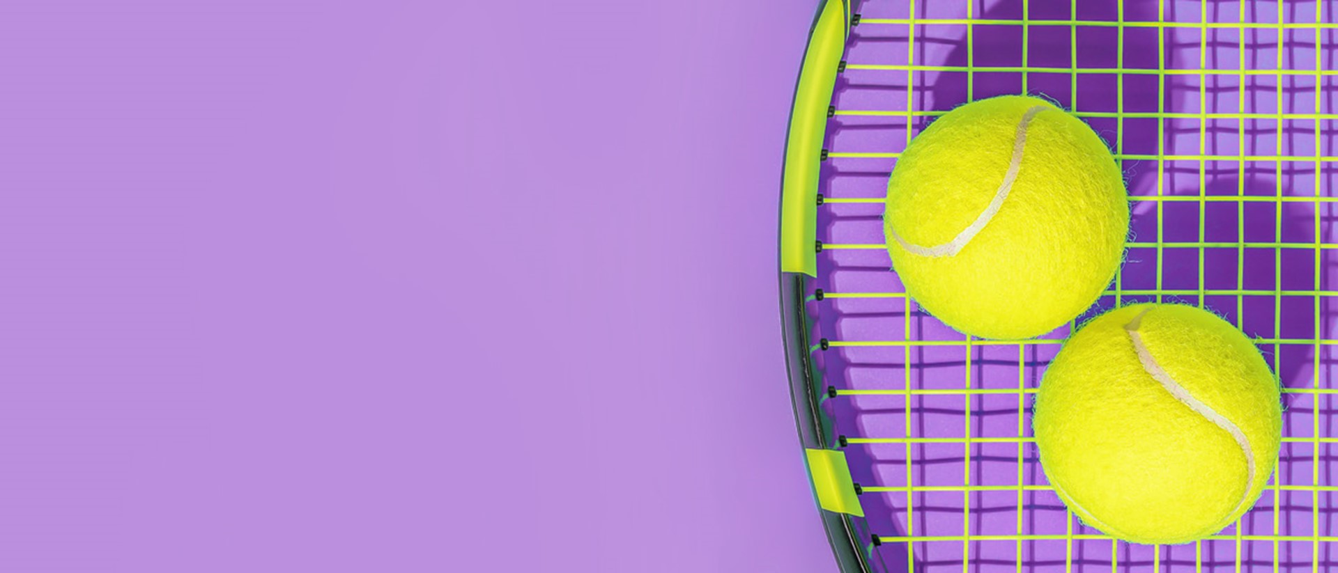 Image of two tennis balls on a tennis racket against a purple background
