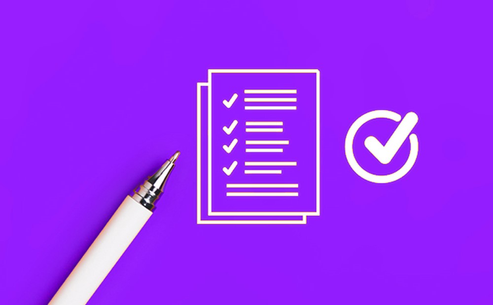 A white pen and a white outline of a checklist against a purple background