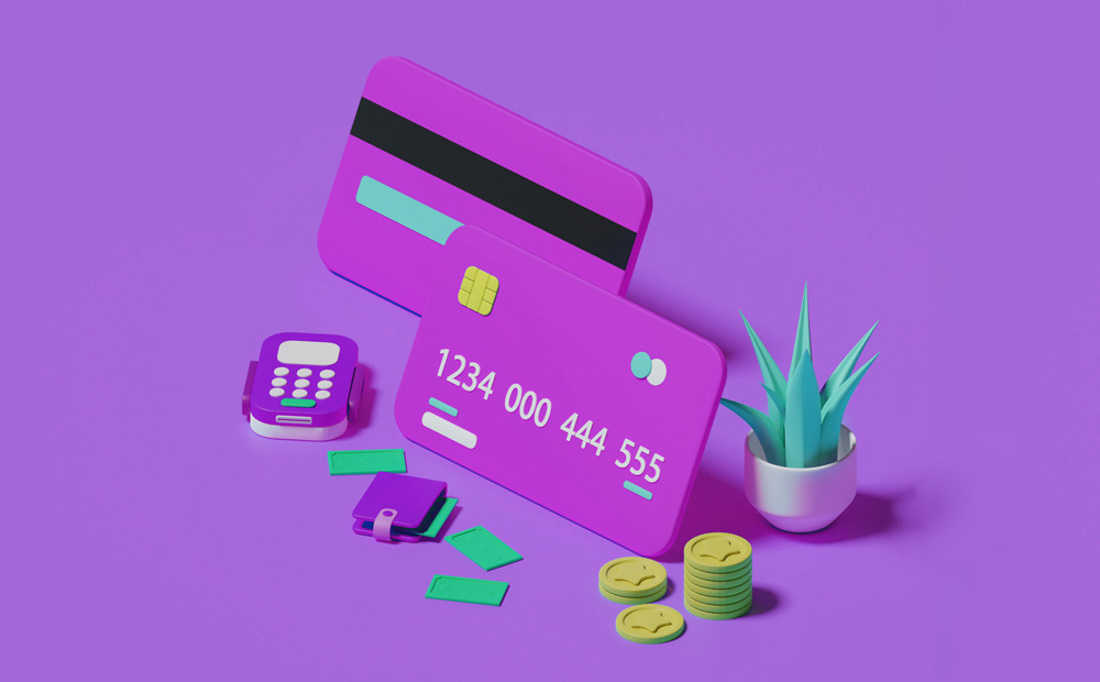 Purple credit cards against a purple background