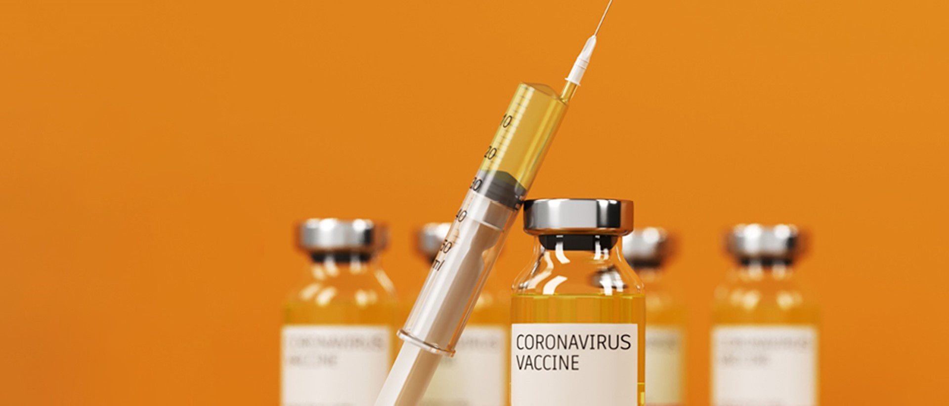 Image of a syringe and jar labelled coronavirus vaccine on an orange background